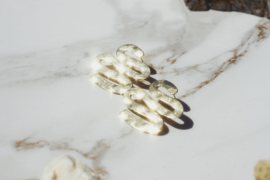 Abstract Snake Studs